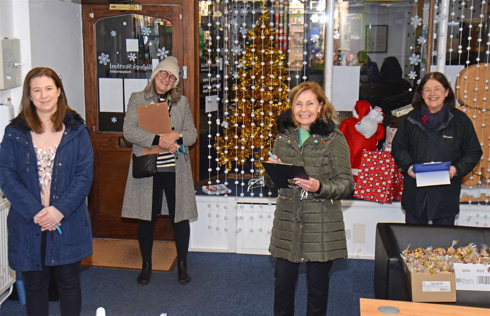 Isabel Hospice Christmas shop window competition judges, from left, Gina Thomas (Bishop's Stortford BID manager), Katie Bradshaw (Coco's chocolaterie owner), Renee Friend (Isabel Hospice fundraiser) and Barbara Doherty (Isabel Hospice life president). Picture: Vikki Lince (43636673)