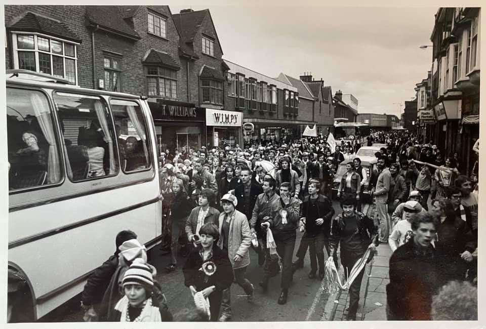 Jubilant fans follow the Bishop's Stortford team coach along South Street. Picture: George Francis