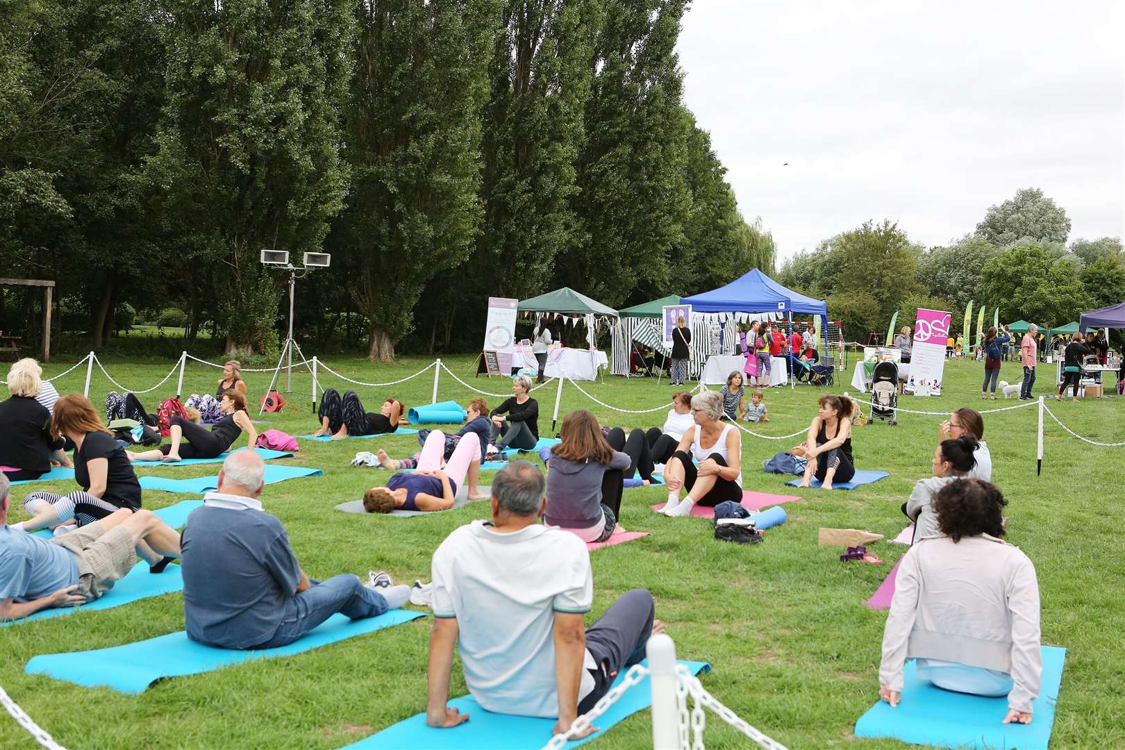Goodness In The Park, Castle Park, Bishops Stortford. Rebecca Young and Tony Boardman taking a Pilates class.. (36522623)