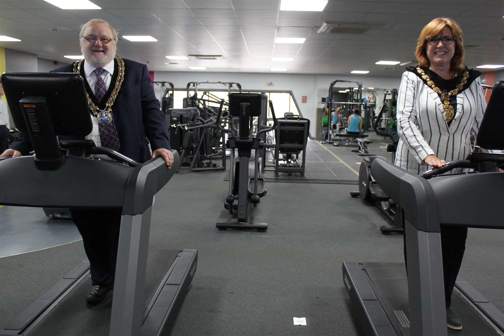 Uttlesford District Council chairman Cllr Martin Foley and Saffron Walden mayor Heather Asker get to work on the treadmills (39850304)