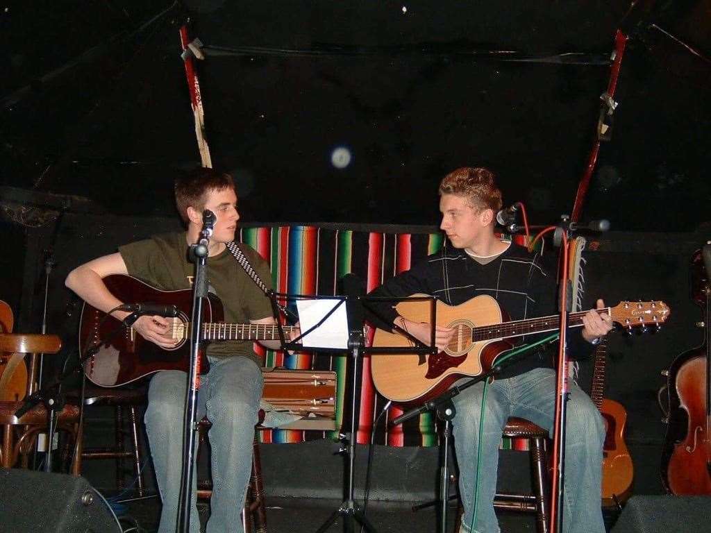 Tom Ryder with Joe Hazell during one of their early gigs at the Bishop's Stortford Acoustic Club at the Half Moon pub in North Street