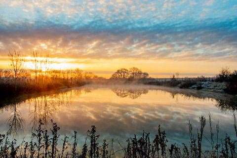 Sunrise on Saturday over the pond at Spellbrook. Picture: David Francis (44754823)